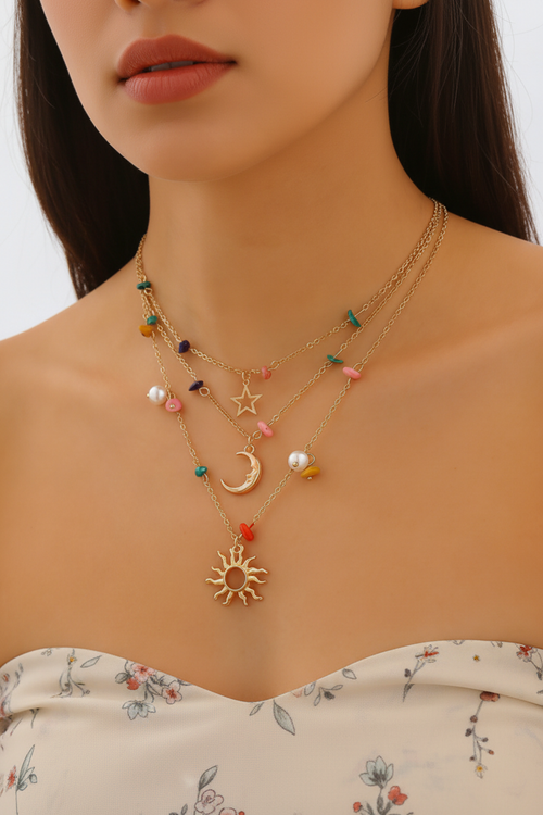 Bohemian layered gold chain necklace with colorful stone chips and sun moon star charms